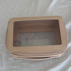 beis toiletry bag